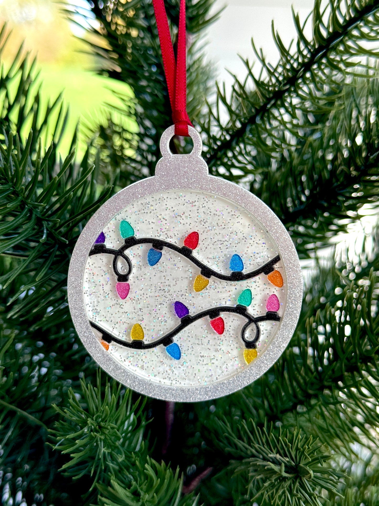 We could leave the Christmas lights up 'til January Ornament